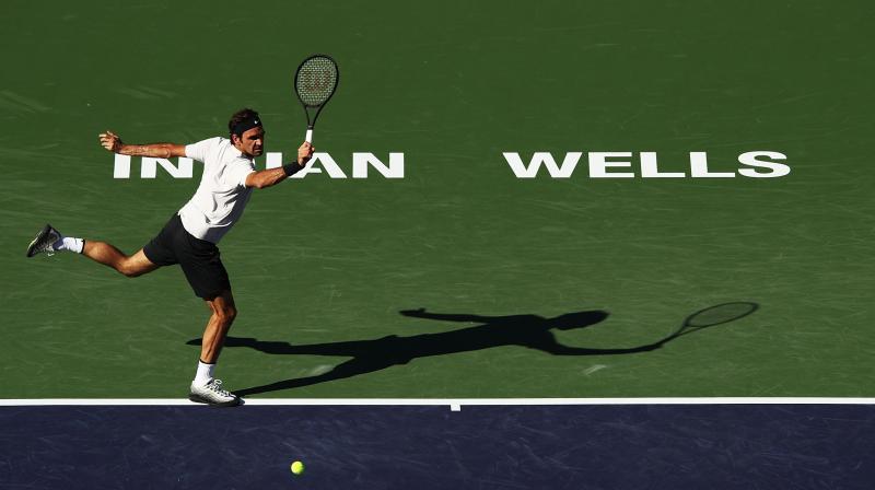 Roger Federer led 6-3, 2-2 when the match was delayed by a heavy drizzle 56 minutes after it began. (Photo: AFP) Roger Federer led 6-3, 2-2 when the match was delayed by a heavy drizzle 56 minutes after it began. (Photo: AFP)