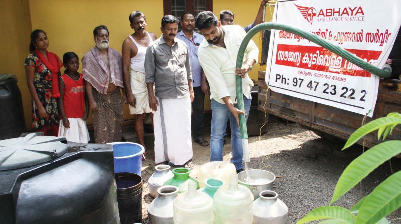 Free drinking water distribute by 'Abhya Ambulance Service" residence of Manipuzha at Nattakam in Kottayam on Wednesday. Free drinking water distribute by 'Abhya Ambulance Service" residence of Manipuzha at Nattakam in Kottayam on Wednesday.