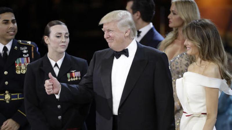 President Donald J. Trump gives a thumbs up after dancing with first lady Melania Trump at The Salute To Our Armed Services Inaugural Ball. (Photo: AP) President Donald J. Trump gives a thumbs up after dancing with first lady Melania Trump at The Salute To Our Armed Services Inaugural Ball. (Photo: AP)