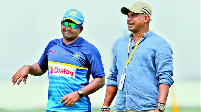SL skipper Rangana Herath (left) and selector Sanath Jayasuriya. (Photo: AP) SL skipper Rangana Herath (left) and selector Sanath Jayasuriya. (Photo: AP)