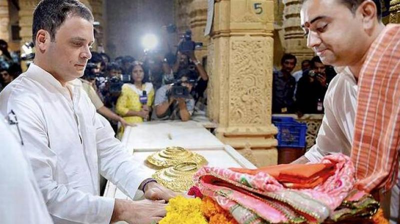 Some BJP workers entered his name in the register meant for non-Hindus at the Somnath temple, leading to the controversy, Rahul Gandhi alleged. (Photo: PTI) Some BJP workers entered his name in the register meant for non-Hindus at the Somnath temple, leading to the controversy, Rahul Gandhi alleged. (Photo: PTI)