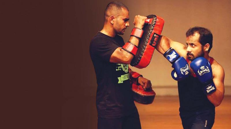 Bivin K (right) sparring with a partner Bivin K (right) sparring with a partner