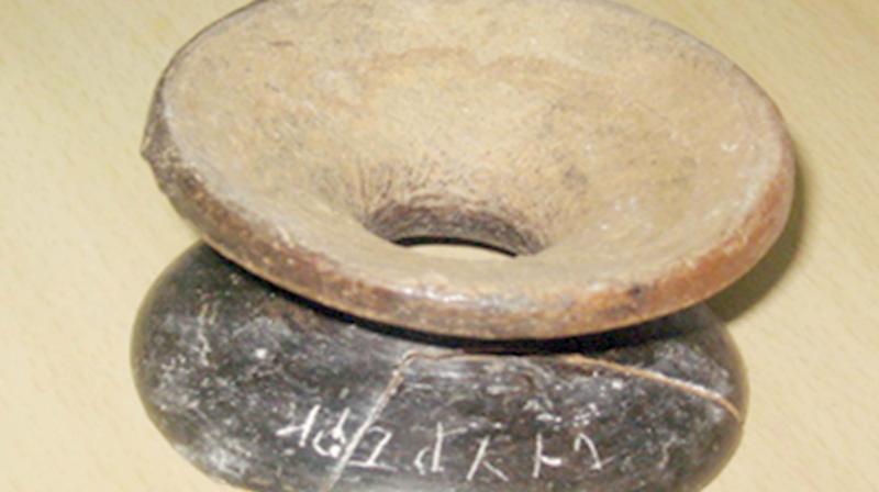 The Tamil Brahmi script in the terracotta weight holder retrieved during a exploration at Thadagam in Coimbatore. (Photo: DC) The Tamil Brahmi script in the terracotta weight holder retrieved during a exploration at Thadagam in Coimbatore. (Photo: DC)