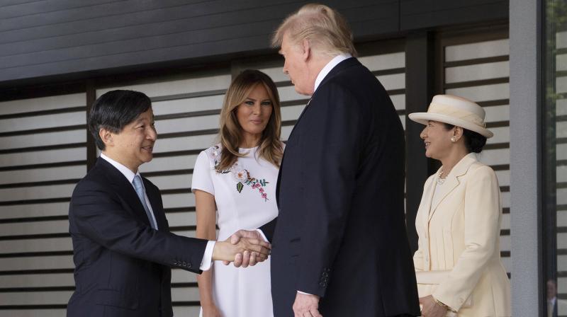 Dining with Abe and their wives at a typical Tokyo grill restaurant on Sunday, Trump said he 'had a great time' and was looking forward to meeting Naruhito. (Photo:AP) Dining with Abe and their wives at a typical Tokyo grill restaurant on Sunday, Trump said he 'had a great time' and was looking forward to meeting Naruhito. (Photo:AP)