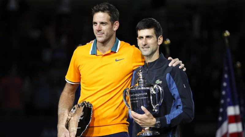 Novak Djokovic clinched his third US Open title with a 6-3, 7-6 (7/4), 6-3 triumph over Juan Martin del Potro, taking him level with Pete Sampras's mark of 14 Grand Slams. (Photo: AP) Novak Djokovic clinched his third US Open title with a 6-3, 7-6 (7/4), 6-3 triumph over Juan Martin del Potro, taking him level with Pete Sampras's mark of 14 Grand Slams. (Photo: AP)