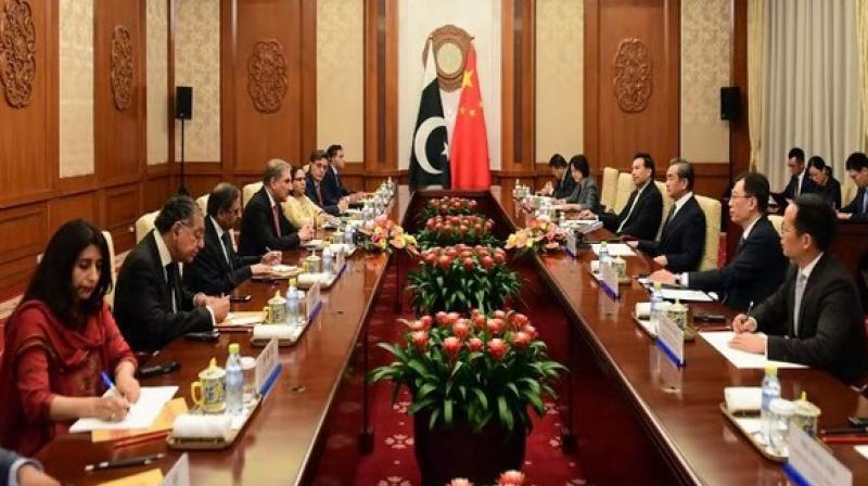 The Chinese Foreign Minister urged both India and Pakistan to properly resolve historical grievances and avoid any action which could further escalate tensions in the region and seek a new path to peaceful co-existence. (Photo: SM Qureshi's twitter) The Chinese Foreign Minister urged both India and Pakistan to properly resolve historical grievances and avoid any action which could further escalate tensions in the region and seek a new path to peaceful co-existence. (Photo: SM Qureshi's twitter)