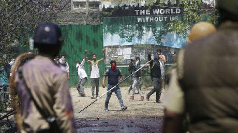 Students protested against the alleged high- handedness of security forces at another protest at Pulwama degree college on Saturday. (Photo: AP) Students protested against the alleged high- handedness of security forces at another protest at Pulwama degree college on Saturday. (Photo: AP)