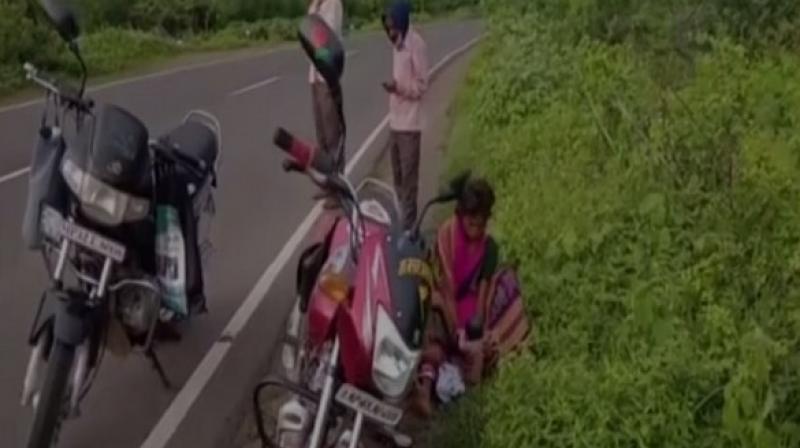When the ambulance did not arrive, the husband of the woman tried to take her to the hospital on a motorcycle but she gave birth to the child even before they could reach the hospital. (Photo: ANI) When the ambulance did not arrive, the husband of the woman tried to take her to the hospital on a motorcycle but she gave birth to the child even before they could reach the hospital. (Photo: ANI)