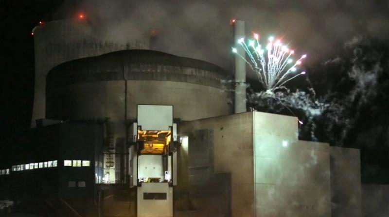Activists launched a firework in the perimeter of a French nuclear plant (Representational Image | AFP) Activists launched a firework in the perimeter of a French nuclear plant (Representational Image | AFP)