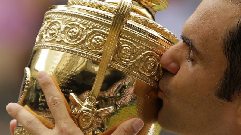 Roger Federer became the first player since Bjorn Borg in 1976 to win Wimbledon without dropping a set in the entire tournament. (Photo: AP) Roger Federer became the first player since Bjorn Borg in 1976 to win Wimbledon without dropping a set in the entire tournament. (Photo: AP)