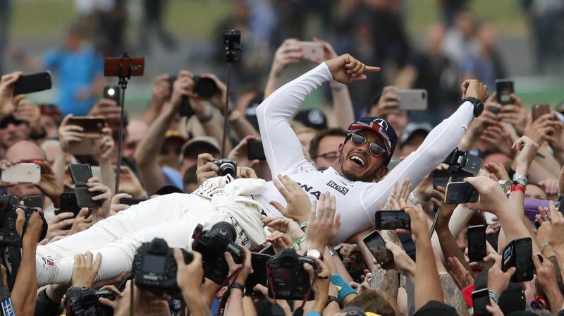 Lewis Hamilton cruised to a 57th career win and soaked up the applause from an army of flag-waving fans. (Photo: AP) Lewis Hamilton cruised to a 57th career win and soaked up the applause from an army of flag-waving fans. (Photo: AP)