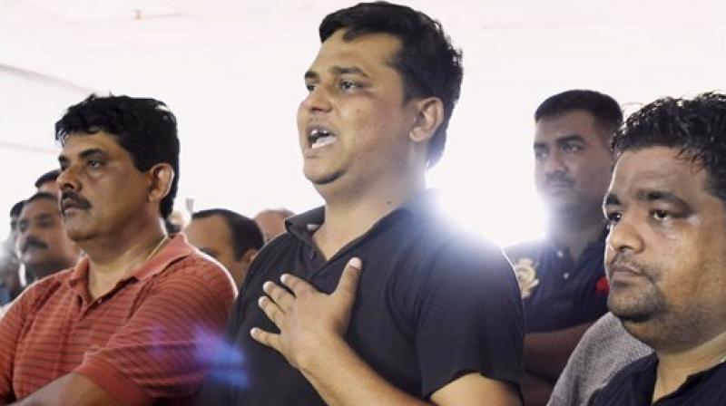 Varun Thakur, father of the student who was allegedly murdered at Ryan International School in Gurugram on Friday. (Photo: AP) Varun Thakur, father of the student who was allegedly murdered at Ryan International School in Gurugram on Friday. (Photo: AP)