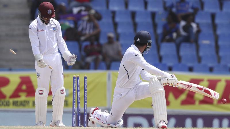 After he was sent back to pavilion with 38 runs score against West Indies on day three of the ongoing first Test, batsman KL Rahul on Sunday said that he was very disappointed adding that he needs to be patient in order to improve his game. (Photo:AP) After he was sent back to pavilion with 38 runs score against West Indies on day three of the ongoing first Test, batsman KL Rahul on Sunday said that he was very disappointed adding that he needs to be patient in order to improve his game. (Photo:AP)