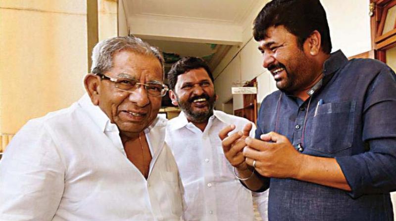 A file photo of Veerashaiva Mahasabha president Shamanur Shivashankarappa and Vinay Kulkarni who are in rival camps on the religion status issue A file photo of Veerashaiva Mahasabha president Shamanur Shivashankarappa and Vinay Kulkarni who are in rival camps on the religion status issue