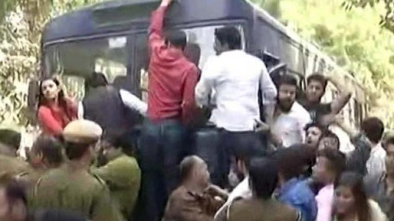 Members of the Delhi University Students Union (DUSU) and ABVP staged a protest. (Photo: Twitter) Members of the Delhi University Students Union (DUSU) and ABVP staged a protest. (Photo: Twitter)