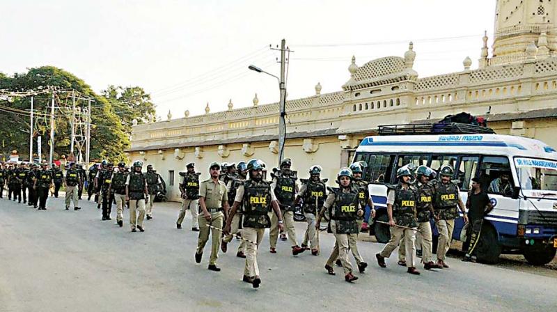 Police personnel being deployed on the eve of Tipu Jayanti, in Srirangapatna on Friday. (KPN) Police personnel being deployed on the eve of Tipu Jayanti, in Srirangapatna on Friday. (KPN)