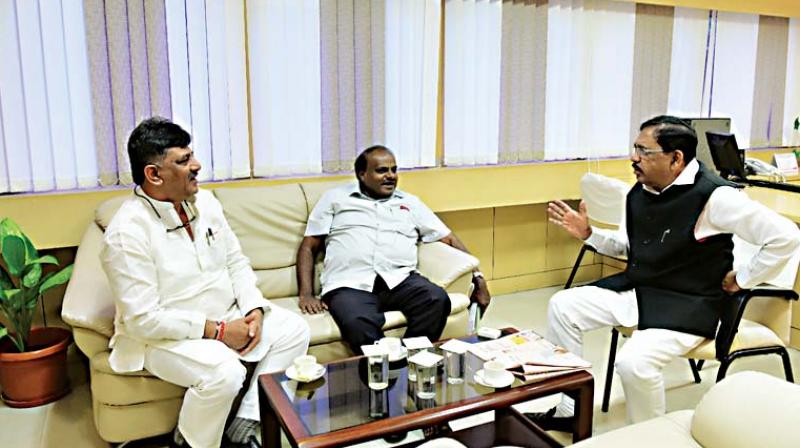 Water Resources Minister D.K. Shivakumar, CM H.D. Kumaraswamy and Deputy CM Dr G. Parameshwar at a meeting in Bengaluru on Monday. Water Resources Minister D.K. Shivakumar, CM H.D. Kumaraswamy and Deputy CM Dr G. Parameshwar at a meeting in Bengaluru on Monday.