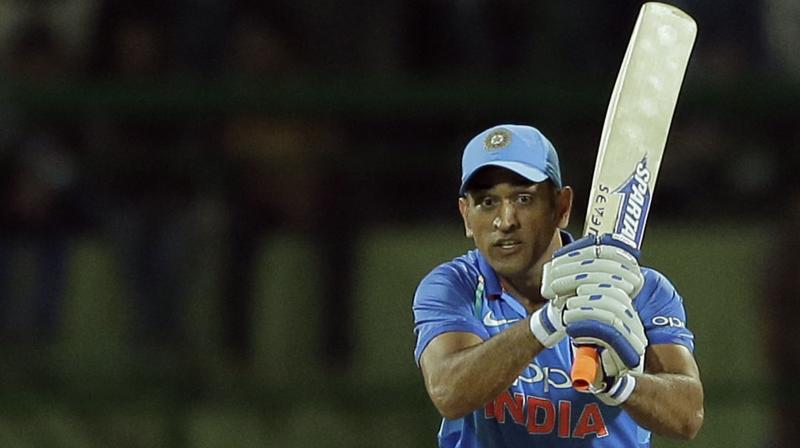 Langer said that Dhoni gave his young side a batting tutorial on how to go about in such a run chase. (Photo: AP) Langer said that Dhoni gave his young side a batting tutorial on how to go about in such a run chase. (Photo: AP)