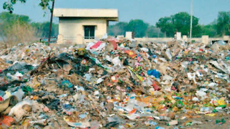 Dump yard in the middle of a residential area in Nallagandla in the tech zone. Dump yard in the middle of a residential area in Nallagandla in the tech zone.