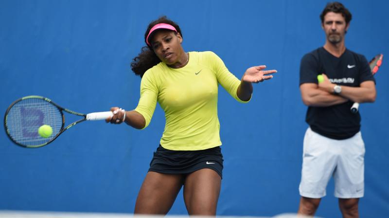Coach Patrick Mouratoglou watches Serena Williams during a practice session. AFP Photo Coach Patrick Mouratoglou watches Serena Williams during a practice session. AFP Photo