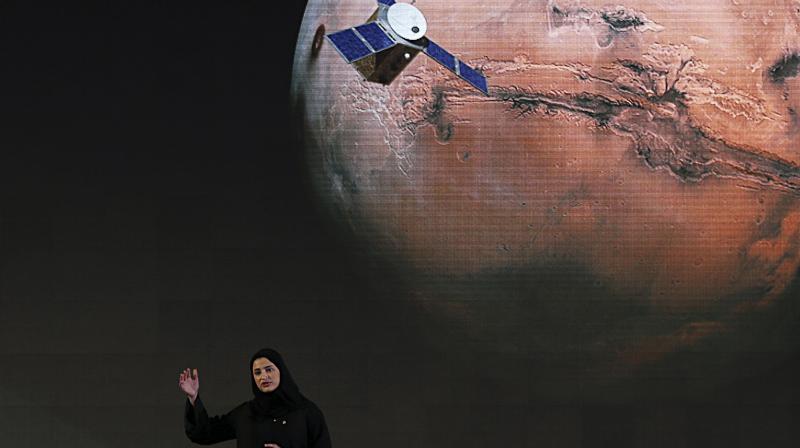 Sarah Amiri, deputy project manager of the United Arab Emirates Mars mission, talks about the project named Hope, or al-Amal in Arabic, which is scheduled for launch in 2020, during a ceremony in Dubai, UAE.(AP)