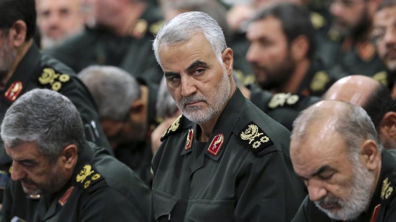 In this Sept. 18, 2016, file photo provided by an official website of the office of the Iranian supreme leader, Revolutionary Guard Gen. Qassem Soleimani, center, attends a meeting in Tehran, Iran. (AP)