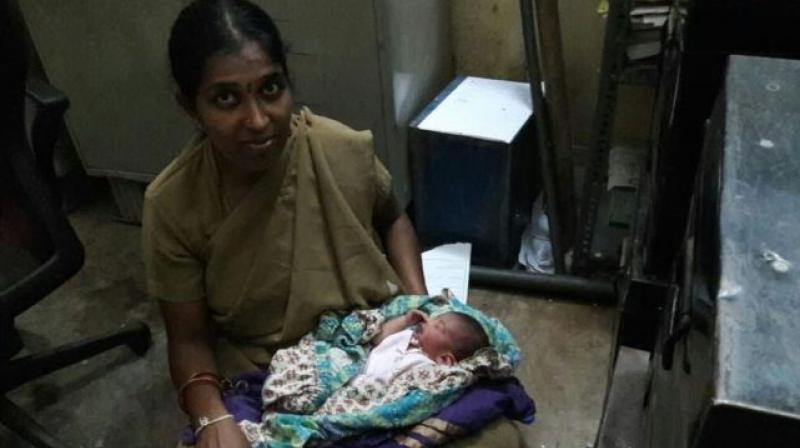 Constable Archana, who had returned to work after a three-month maternity leave, couldn't bear the newborn's cries and decided to breastfeed the baby. (Photo: ANI) Constable Archana, who had returned to work after a three-month maternity leave, couldn't bear the newborn's cries and decided to breastfeed the baby. (Photo: ANI)