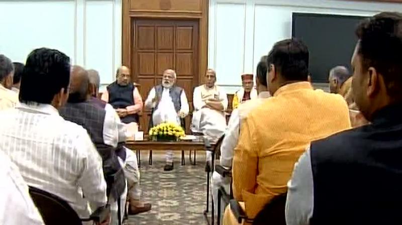 Prime Minister Narendra Modi in a meeting with BJP MPs from UP. (Photo: ANI Twitter) Prime Minister Narendra Modi in a meeting with BJP MPs from UP. (Photo: ANI Twitter)