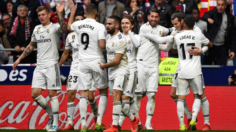 Bale's 100th goal for Madrid ended Atletico's hopes of a comeback after Sergio Ramos' penalty put Real in front at half-time, with Antoine Griezmann earlier cancelling out Casemiro's acrobatic opener. (Photo: AFP) Bale's 100th goal for Madrid ended Atletico's hopes of a comeback after Sergio Ramos' penalty put Real in front at half-time, with Antoine Griezmann earlier cancelling out Casemiro's acrobatic opener. (Photo: AFP)