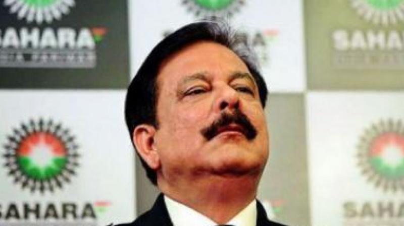 Embattled Sahara group has said it is confident of getting out of long-running financial constraints by the next financial year and will regain a key position as an Indian conglomerate by entering several new businesses. (Photo: PTI) Embattled Sahara group has said it is confident of getting out of long-running financial constraints by the next financial year and will regain a key position as an Indian conglomerate by entering several new businesses. (Photo: PTI)