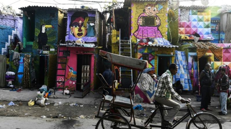 The initiative came about at the request of a local parliamentarian who wanted to beautify and transform the area better known for its dirt and foul smell than art. (Photo: AFP) The initiative came about at the request of a local parliamentarian who wanted to beautify and transform the area better known for its dirt and foul smell than art. (Photo: AFP)