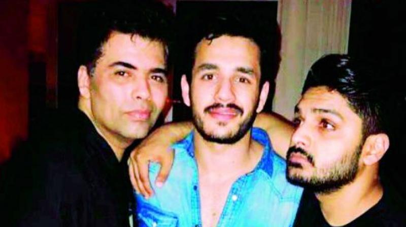 Akhil poses with Karan Johar at the party Akhil poses with Karan Johar at the party