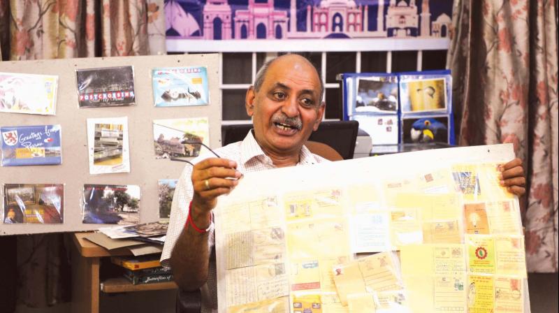 Colonel Akhil Kumar (retd) with his postcards (Photo: R. Samuel) Colonel Akhil Kumar (retd) with his postcards (Photo: R. Samuel)