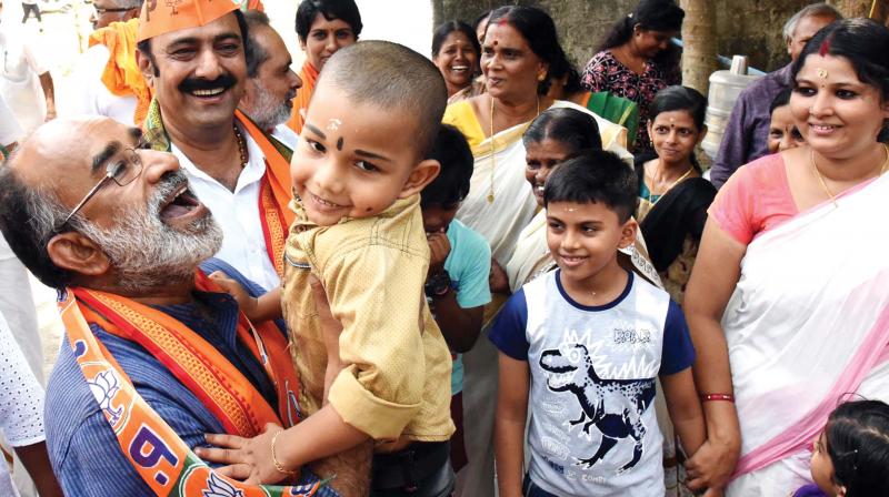 Ernakulam Lok Sabha constituency NDA candidate Alphons Kannamthanam during the election campaign at Thrikkakara on Monday. Ernakulam Lok Sabha constituency NDA candidate Alphons Kannamthanam during the election campaign at Thrikkakara on Monday.