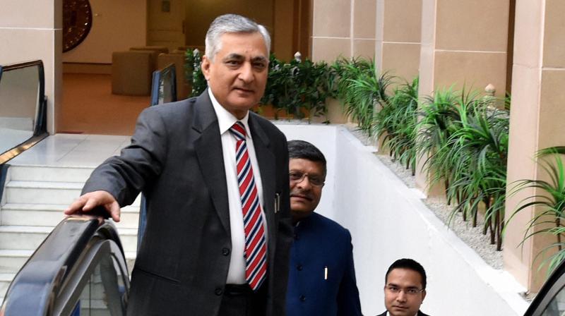 Chief Justice of India T S Thakur with Union Law Minister Ravi Shankar Prasad arrives for the All India Conference of the central Administrative Tribunal (CAT) in New Delhi. (Photo: PTI) Chief Justice of India T S Thakur with Union Law Minister Ravi Shankar Prasad arrives for the All India Conference of the central Administrative Tribunal (CAT) in New Delhi. (Photo: PTI)