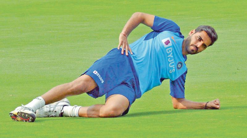 Indian pacer Bhuvneshwar Kumar during a practice session in Dharamsala. DC Photo Indian pacer Bhuvneshwar Kumar during a practice session in Dharamsala. DC Photo
