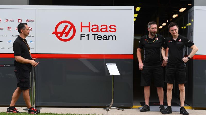 Members of the Hass F1 team at the Albert Park circuit on Wednesday. AFP Photo