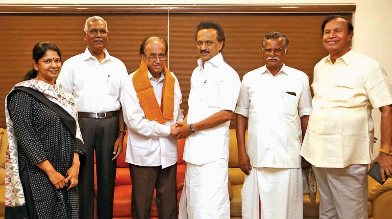 DMK president M.K. Stalin greets CPI leader Sudhakar Reddy at Anna Arivalayam in Chennai on Tuesday. Also seen are (L to R) DMK MP Kanimozhi, CPI MP D. Raja , State CPI secretary R. Mutharasan and former union minister T.R. Baalu. (Photo: DC) DMK president M.K. Stalin greets CPI leader Sudhakar Reddy at Anna Arivalayam in Chennai on Tuesday. Also seen are (L to R) DMK MP Kanimozhi, CPI MP D. Raja , State CPI secretary R. Mutharasan and former union minister T.R. Baalu. (Photo: DC)