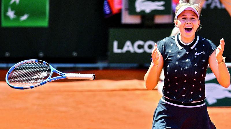 Amanda Anisimova celebrates after defeating Simona Halep in the women’s singles quarter-final of the French Open in Paris on Thursday. (Photo: AFP) Amanda Anisimova celebrates after defeating Simona Halep in the women’s singles quarter-final of the French Open in Paris on Thursday. (Photo: AFP)