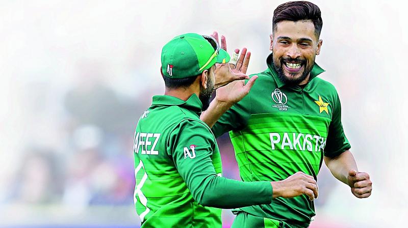 Amir's presence in the side is a big positive feels Akram. The left arm pacer took 5 for 30 against Australia albeit in a lost cause. (Photo: File) Amir's presence in the side is a big positive feels Akram. The left arm pacer took 5 for 30 against Australia albeit in a lost cause. (Photo: File)