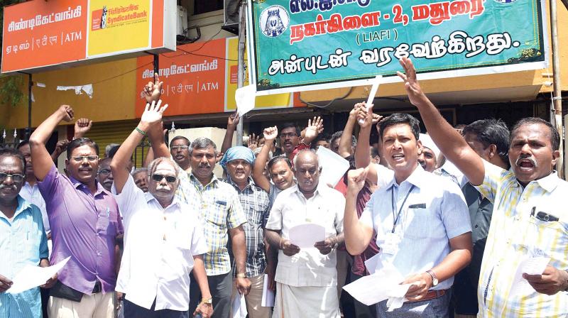 LIC agents protest against GST in Madurai on Saturday —PTI LIC agents protest against GST in Madurai on Saturday —PTI