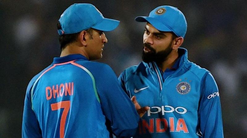 India captain Virat Kohli on Tuesday said he hasn't had any conversation with Sourav Ganguly with regards to Mahendra Singh Dhoni's international future and believes that the BCCI's President-elect will get in touch with him when he needs to. (Photo:AFP) India captain Virat Kohli on Tuesday said he hasn't had any conversation with Sourav Ganguly with regards to Mahendra Singh Dhoni's international future and believes that the BCCI's President-elect will get in touch with him when he needs to. (Photo:AFP)