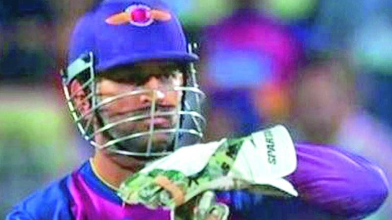 A file photo of M.S. Dhoni sarcastically appealing for a dismissal during the 10th edition of the IPL. A file photo of M.S. Dhoni sarcastically appealing for a dismissal during the 10th edition of the IPL.