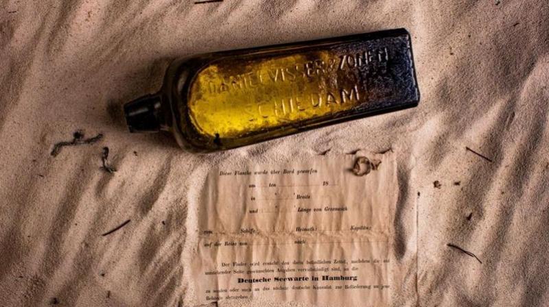 Griffin suspected that the bottle had been buried on a beach for years then refloated by a storm. (Photo: AP) Griffin suspected that the bottle had been buried on a beach for years then refloated by a storm. (Photo: AP)