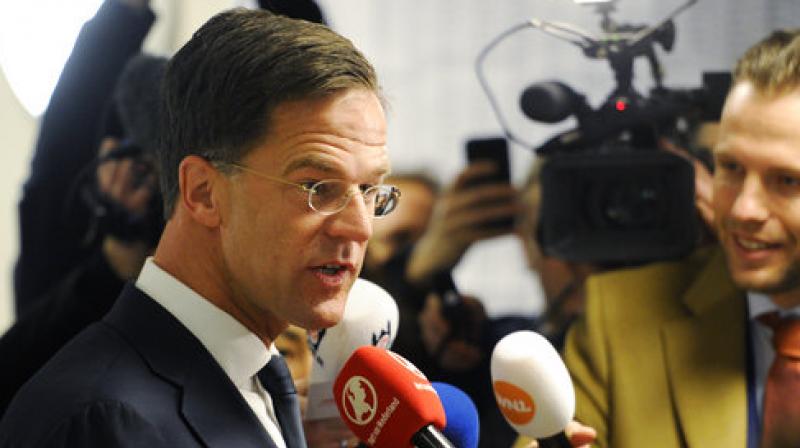 Dutch Prime Minister Mark Rutte answers journalists' questions after casting his vote for the Dutch general election in The Hague, Netherlands. (Photo: AP) Dutch Prime Minister Mark Rutte answers journalists' questions after casting his vote for the Dutch general election in The Hague, Netherlands. (Photo: AP)