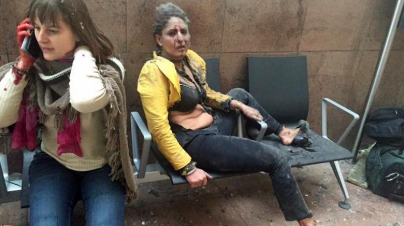 This photograph of Chaphekar had become a defining image of the March 22 bombing in the Brussels airport and subway. (Photo: AP) This photograph of Chaphekar had become a defining image of the March 22 bombing in the Brussels airport and subway. (Photo: AP)