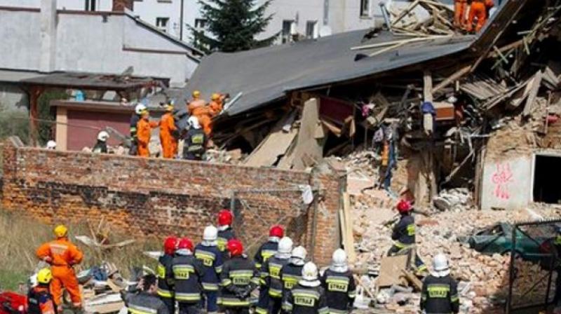 Prosecutors and experts continue to gather evidence at the site. (Photo: AP) Prosecutors and experts continue to gather evidence at the site. (Photo: AP)