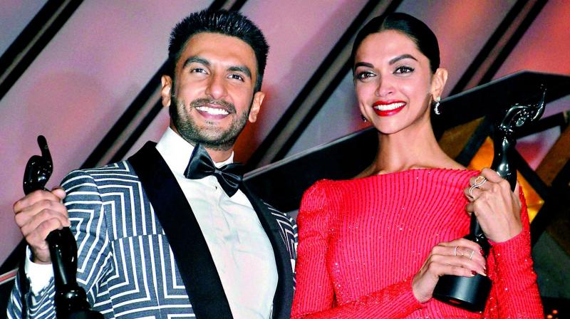 Ranveer Singh and Deepika Padukone pose with the ‘best actor’ and ‘best actress’ award, from an awards event last year. Ranveer Singh and Deepika Padukone pose with the ‘best actor’ and ‘best actress’ award, from an awards event last year.