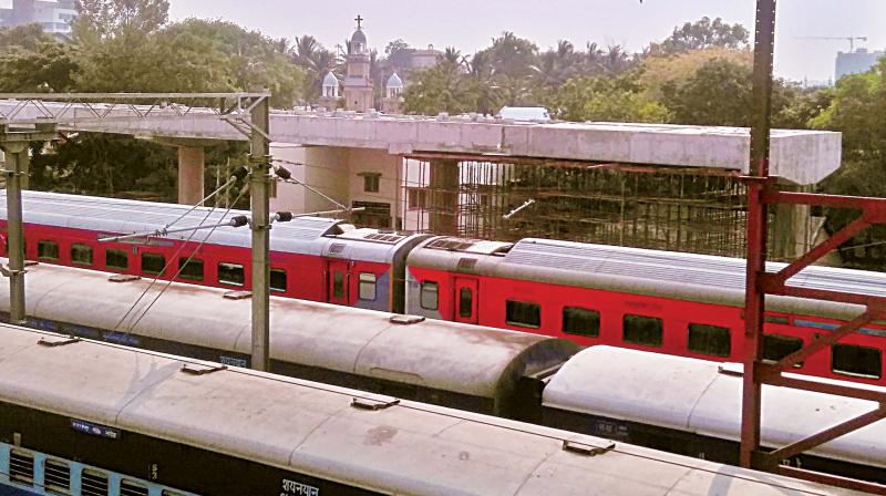 The incomplete foot-over-bridge connecting BMRCL’s city railway metro station and KSR station. (Photo: DC) The incomplete foot-over-bridge connecting BMRCL’s city railway metro station and KSR station. (Photo: DC)