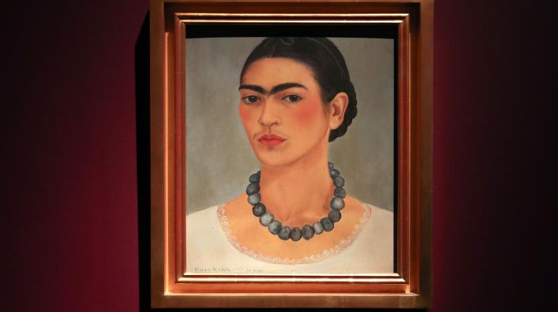 An artwork entitled 'Self-portrait with Necklace', by Frida Kahlo, 1933, Detroit and New York, USA, is displayed during an exhibition entitled 'Frida Kahlo: Making Her Self Up' at the Victoria and Albert (V&A) Museum in west London on June 13, 2018.(Photo: AFP) An artwork entitled 'Self-portrait with Necklace', by Frida Kahlo, 1933, Detroit and New York, USA, is displayed during an exhibition entitled 'Frida Kahlo: Making Her Self Up' at the Victoria and Albert (V&A) Museum in west London on June 13, 2018.(Photo: AFP)